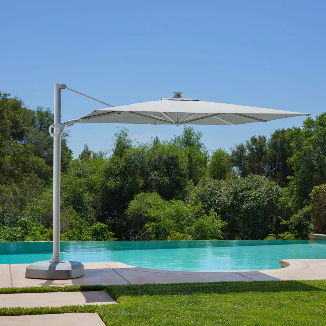 A cantilever umbrella by the pool