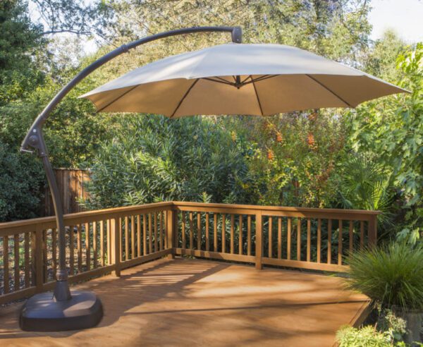 Cantilever Umbrella Coffee Pole Finish beside garden