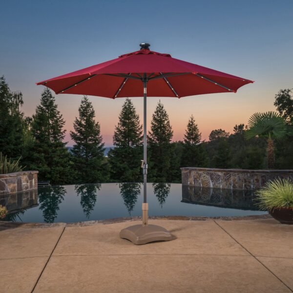 Red Ten feet Solar LED Umbrella beside pool