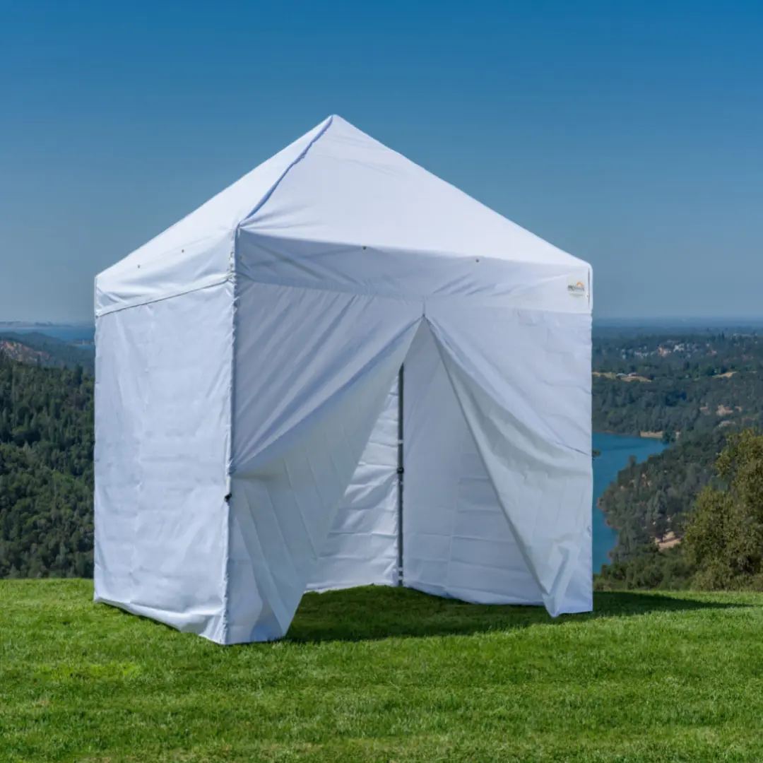 White Instant Canopy placed on the grass